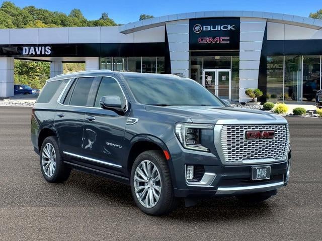 2021 GMC Yukon Denali in Dark Sky Metallic — front three-quarter view
