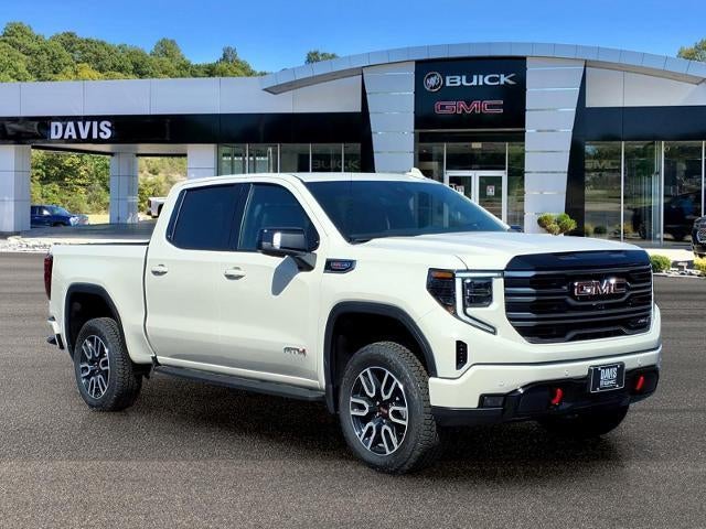 2026 GMC Sierra 1500 AT4 in Coastal Dune — front three-quarter view