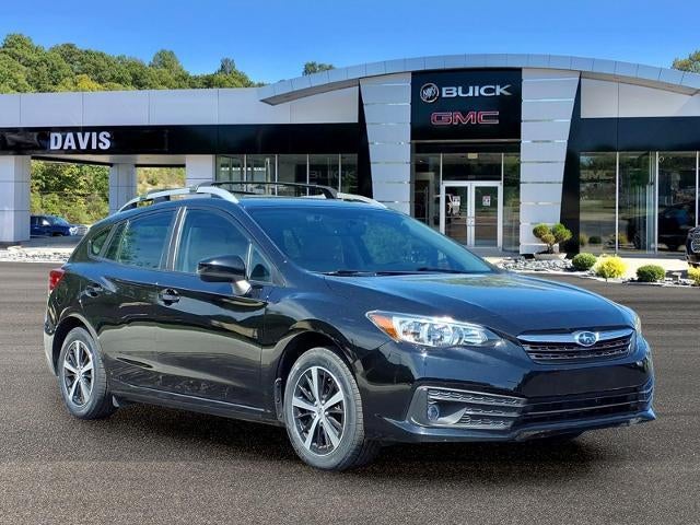 2023 Subaru Impreza Premium in Crystal Black Sil — front three-quarter view